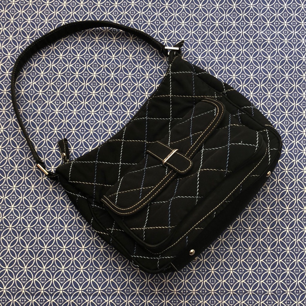 Vera Bradley navy purse - cross-hatch exterior, floral pattern interior.
